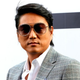 the actor in sunglasses on the red carpet